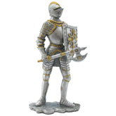 Statue of a knight in silver and gold armor holding a sword and shield on a white background