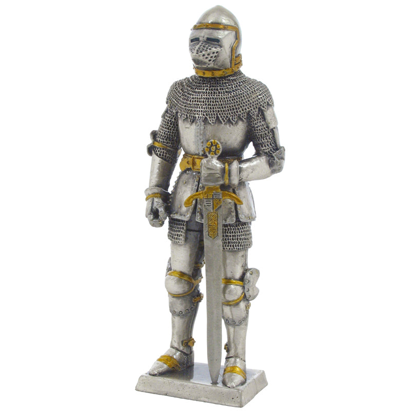 Statue of a knight in full armor holding a sword on a white background