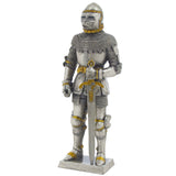 Statue of a knight in full armor holding a sword on a white background