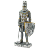 Statue of a knight in armor with a shield featuring a lion emblem on a white background