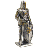 Statue of a knight in armor with a sword and shield on a white background