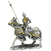 Metallic figurine of a knight on horseback with armor and spear on a white background