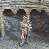 King Arthur metal knight statue with themed background