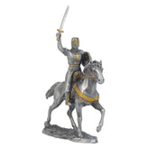 Statue of a knight on horseback holding a sword against a white background