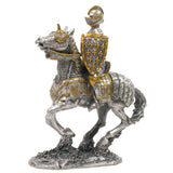 Decorative figurine of a knight on horseback with armor and shield on a white background