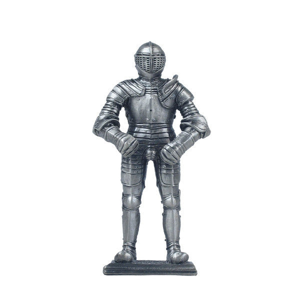 A pewter-plated metal knight in armour figurine, standing on a square base.