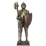 A resin statue of a knight in armor holding a halberd and a shield with an eagle design.